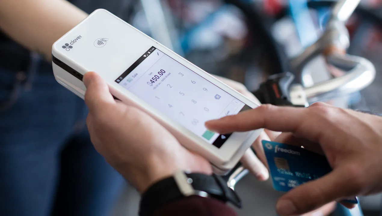 Clover Flex handheld terminal being used to take a card payment