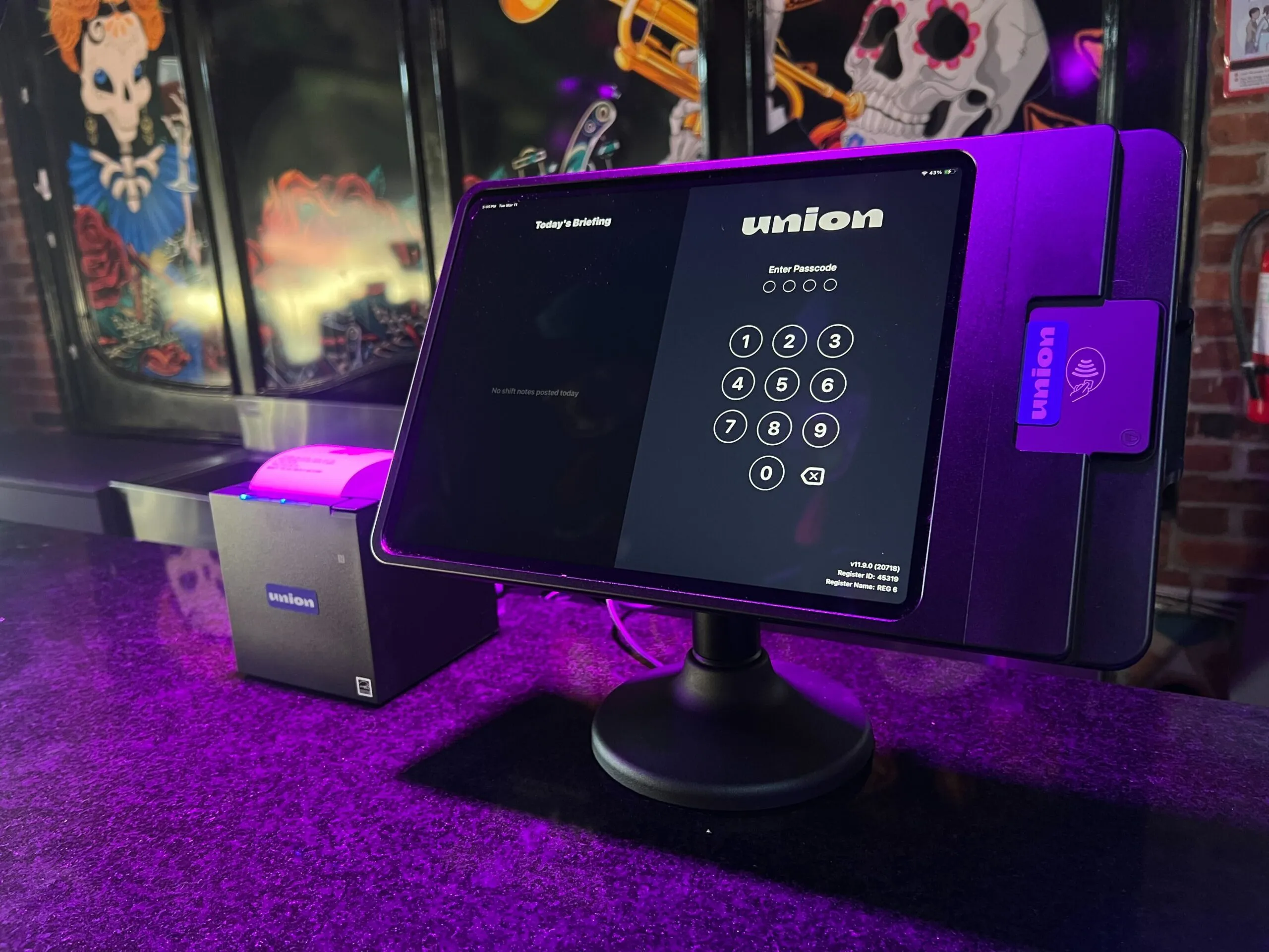 Union POS terminal on a bar counter